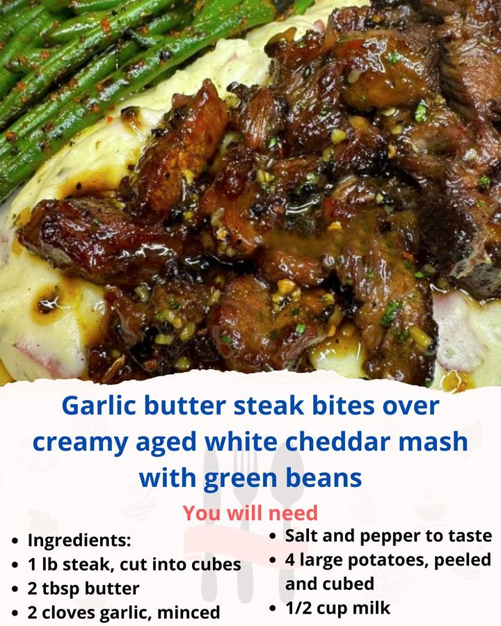 Garlic butter steak bites over creamy aged white cheddar mash with green beans